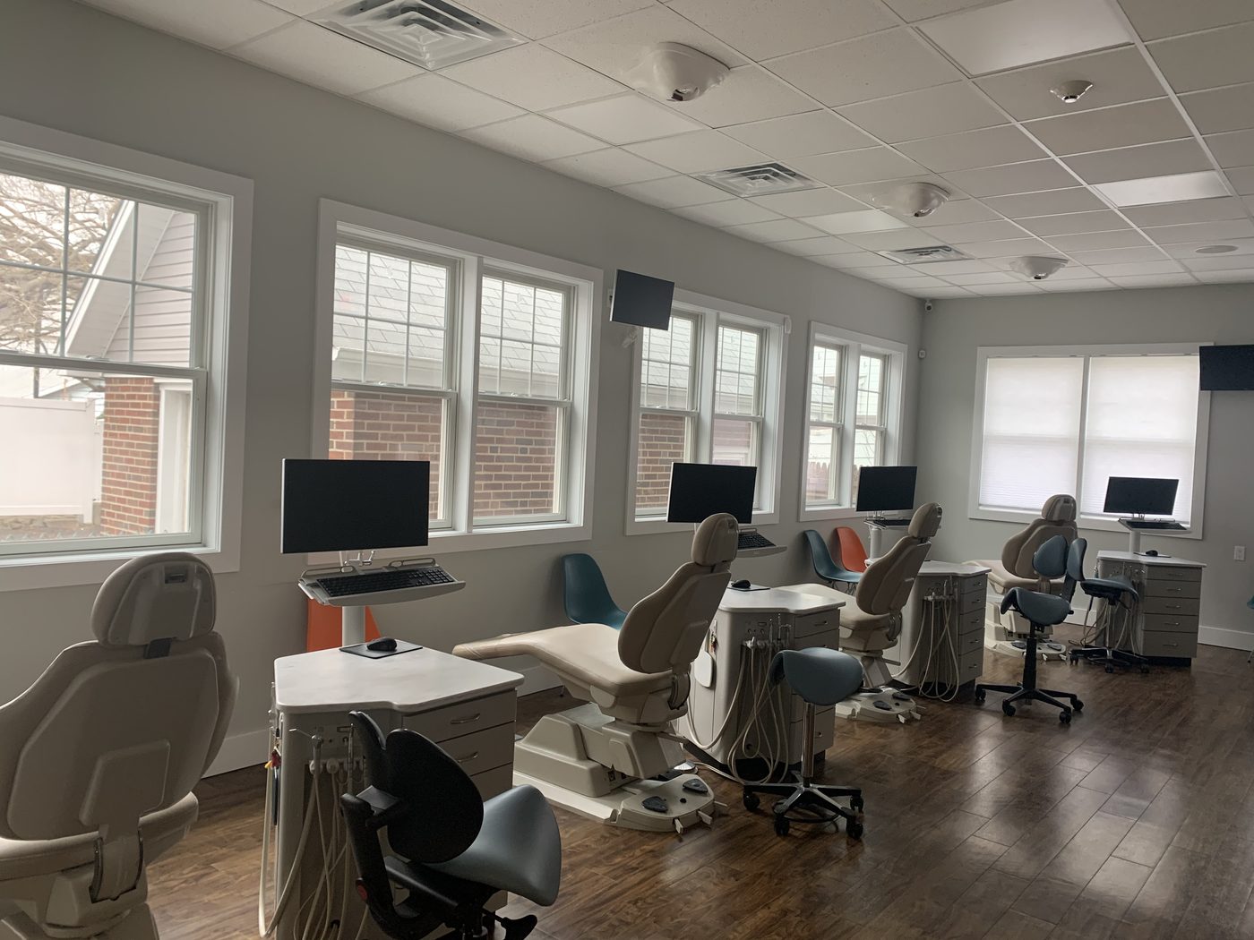 Bright, modern treatment area inside NA Orthodontics in North Arlington, NJ